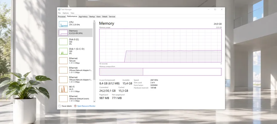 Windows 10 Task Manager showing normal memory usage after cleanup on a bright desktop